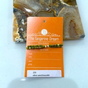 Brand new, olive seed bracelet